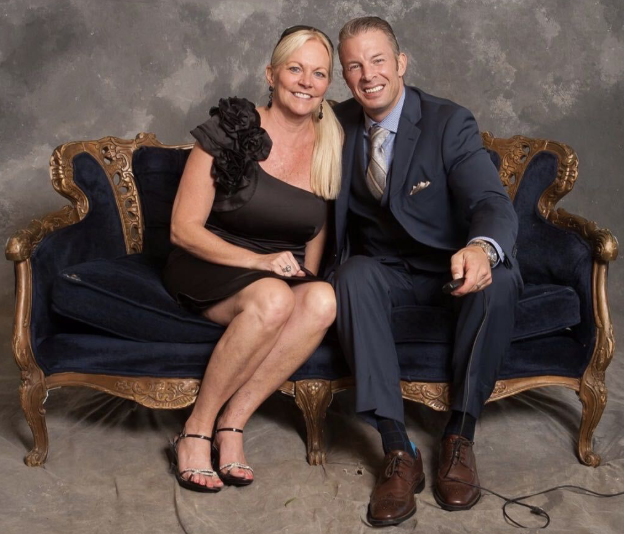 Shaun Hadsall with his wife on the sofa